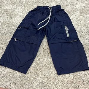 Vintage Extreme Limit windbreaker pants. Legs can zip off to become shorts